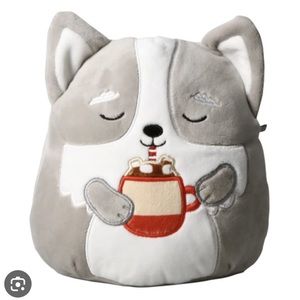 I am selling a Christmas squishmellow. It is a wolf holding hot chocolate.
